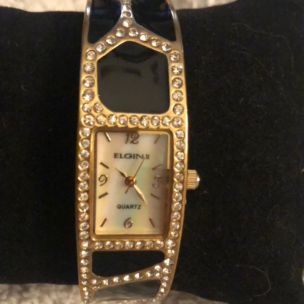 Elgin black and gold tone mother of pearl faced bracelet watch